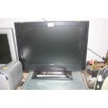 A Technica flat screen television with remote cont