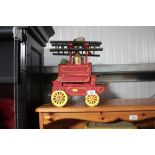 A wooden model of a horsedrawn fire engine