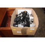 A box of various cameras etc.