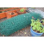 A roll of wire fencing