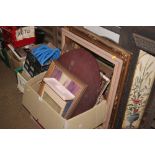 A box of mostly picture frames