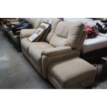 A cream upholstered two seater settee with matchin