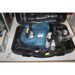 A Power Craft rotary hammer drill in fitted case