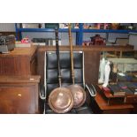 Two copper warming pans with turned wooden handles