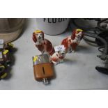 Three Staffordshire dog ornaments; together with a