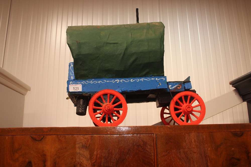 A wooden model of a Gypsy caravan