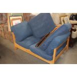 A modern blue upholstered sofa