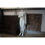A female mannequin on stand