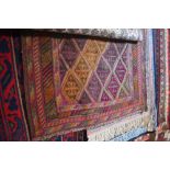 An approx. 3'11" x 3'9" Gazak rug