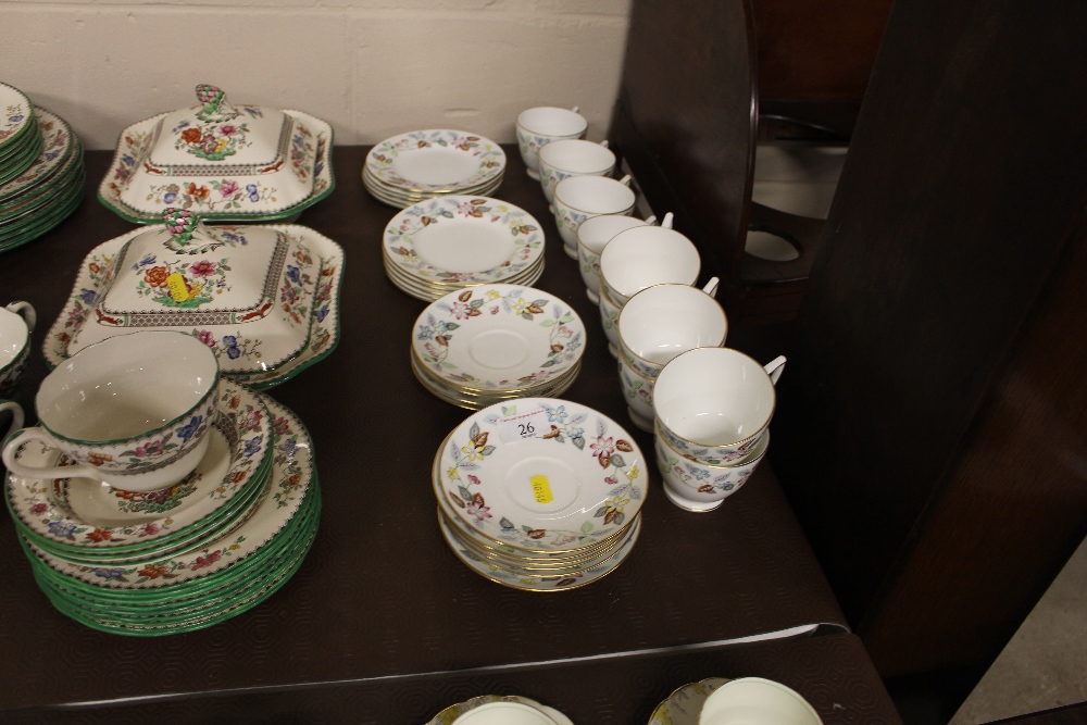 A quantity of Minton "Cherrydown" tea cups and sau