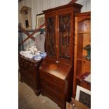 An Edwardian mahogany inlaid bureau fitted three l