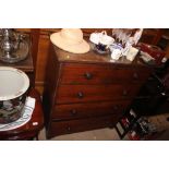 A Victorian mahogany chest fitted four long drawer