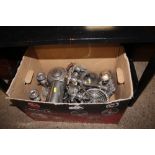 A box of various silver platedware