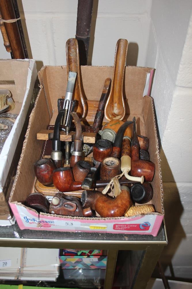 A box of various pipes and stands