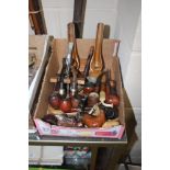 A box of various pipes and stands