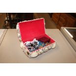 A shell encrusted jewellery box and contents of co