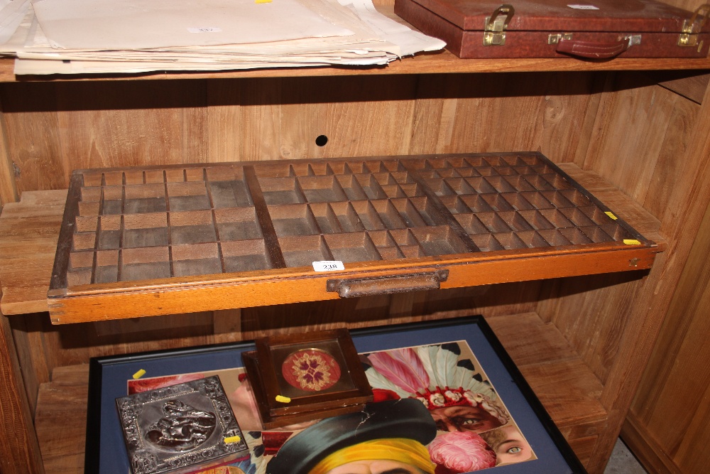 A wooden printers tray