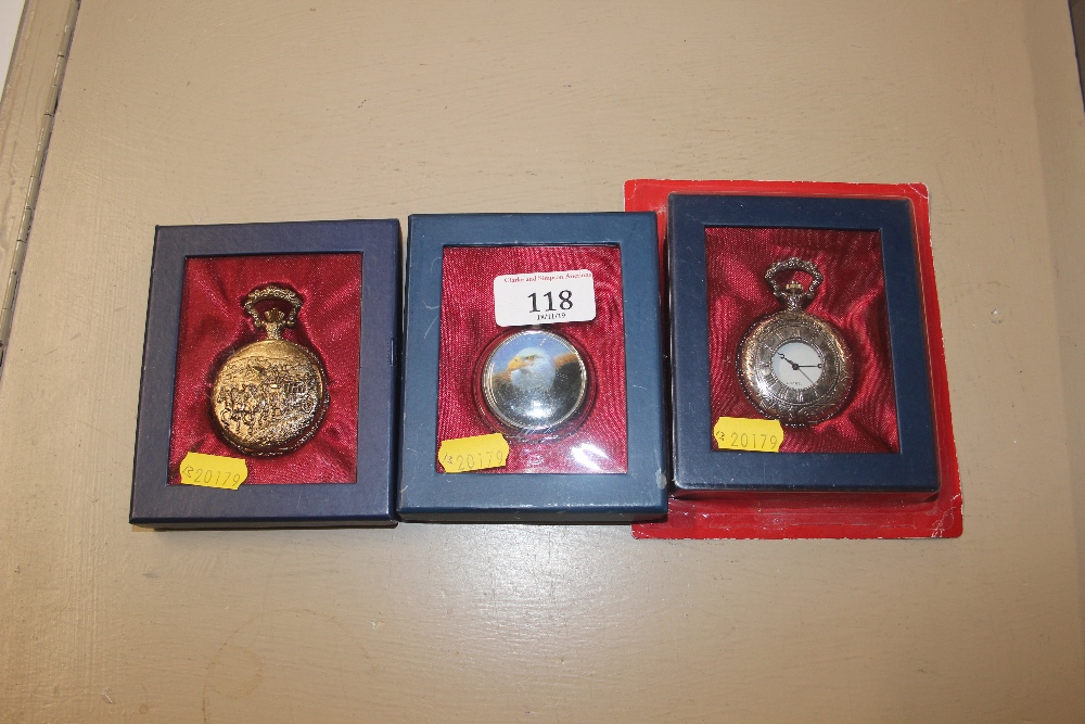 Three modern pocket watches