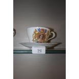 An Aynsley commemorative tea cup and saucer