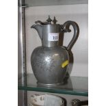 A silver plated and floral decorated ewer