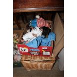 A box and a basket of dolls and clothing