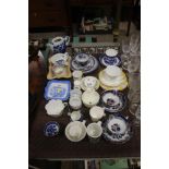 A quantity of various teacups and saucers; a flora