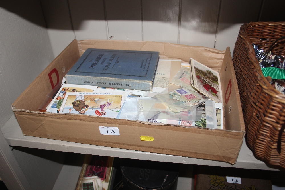 A box of miscellaneous items to include post-cards