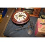 A Victorian mahogany cased wall clock