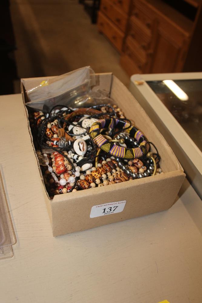 A box of African bead, shell and other jewellery