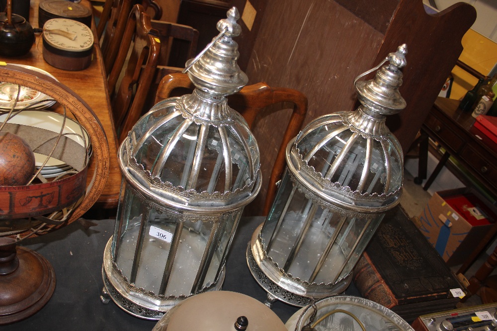 A pair of silvered lanterns