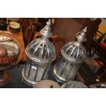 A pair of silvered lanterns