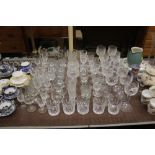 A quantity of various drinking glasses