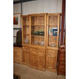 A large stripped pine dresser fitted four drawers