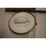 A 19th Century oval framed study of a standing wom