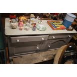 A painted two drawer sideboard