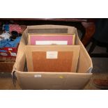 A box of pictures and prints