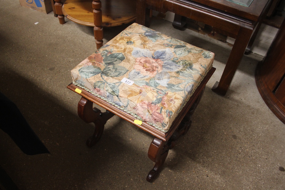 A Victorian mahogany and floral upholstered stool