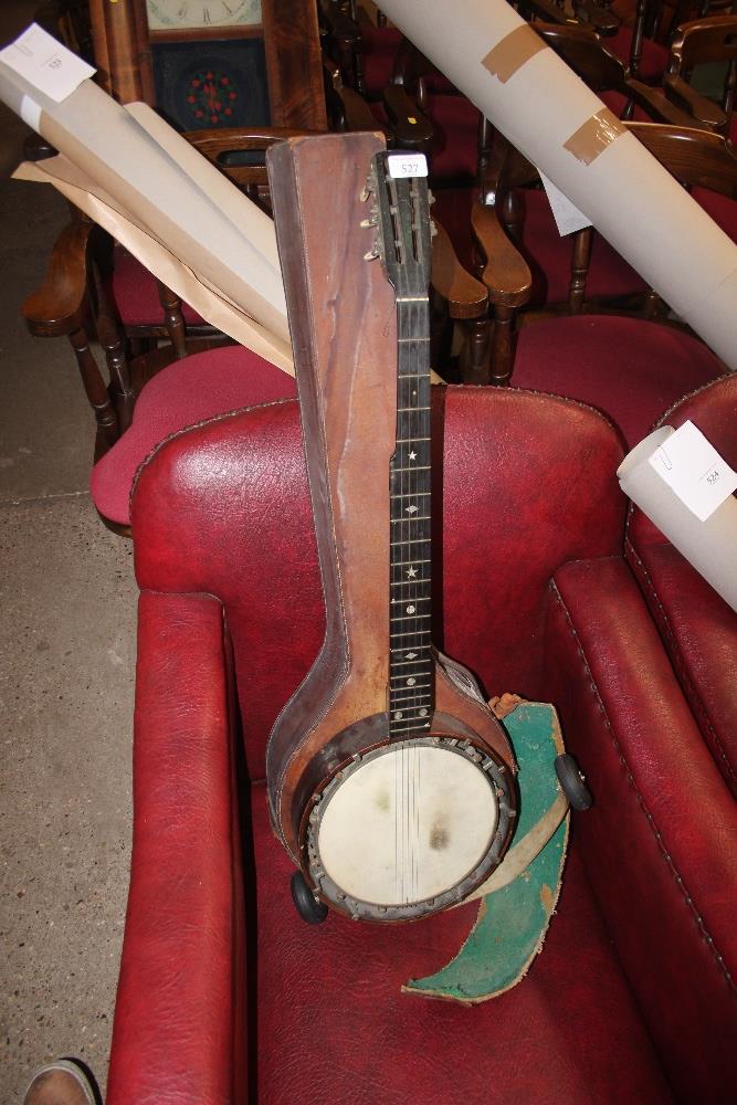 A banjo with leather carrying case