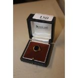 A 9ct gold onyx signet ring