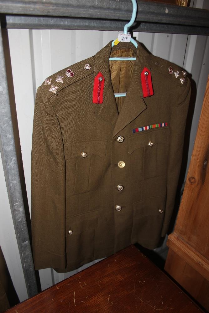 An Army Brigadiers jacket complete with medal bar