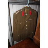 An Army Brigadiers jacket complete with medal bar