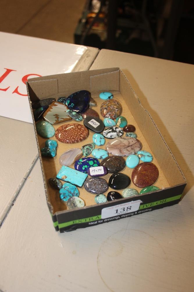 A box of various polished hardstones