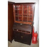 A bureau bookcase fitted two drawers