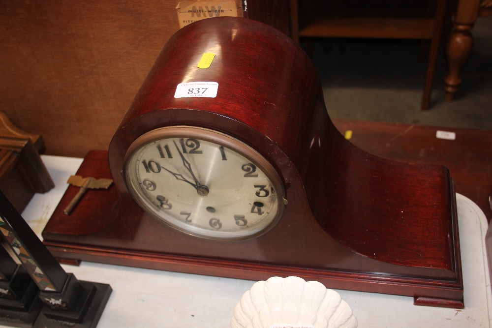 A three hole mantel clock