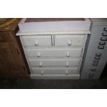 A white painted pine chest fitted two short over t