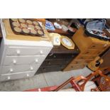 An oak veneered chest of five long drawers; togeth