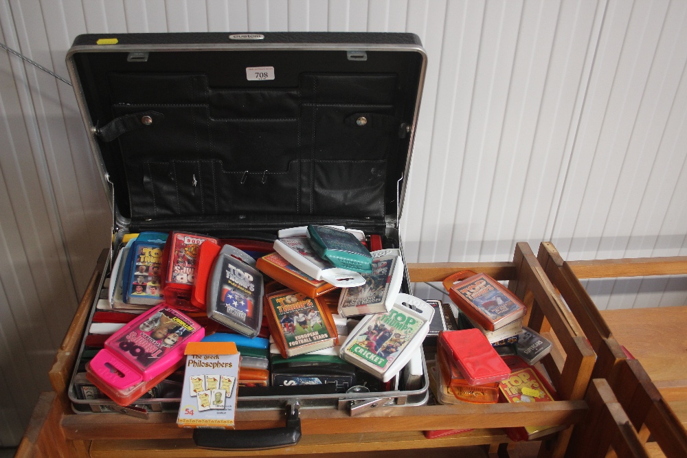 A brief case and contents of various collector's c