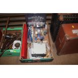 A box containing various door furniture, two car r