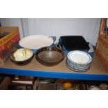 Three cooking dishes; together with a quantity of