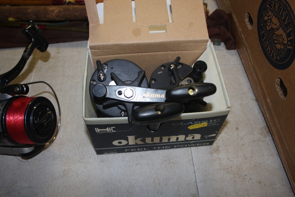 A pair of Okuma classic multiplier fishing reels